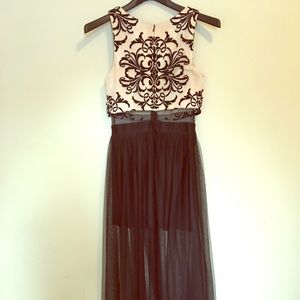 Formal dress black and cream, with sheer middle